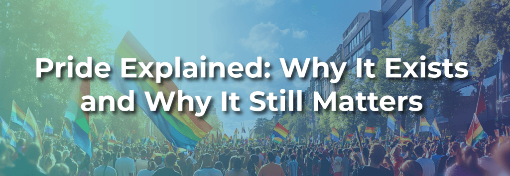 Wide banner image of a crowded Pride parade with rainbow flags waving through a city street, overlaid with the headline “Pride Explained: Why It Exists and Why It Still Matters” in bold white text.